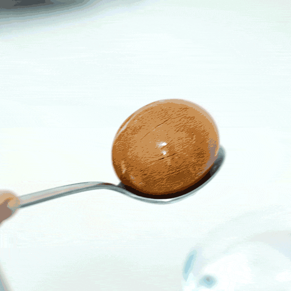 boiled egg placed in cold water